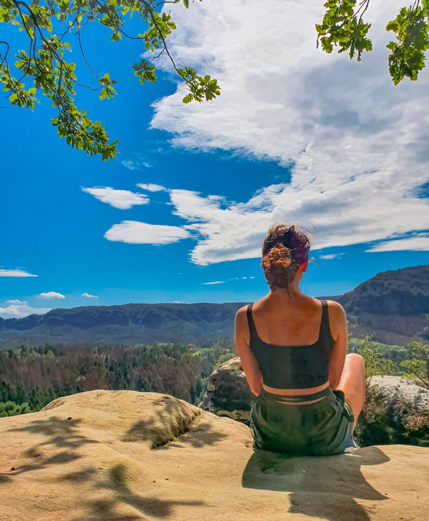 Rox in Saxon Switzerland Woman enjoying the view of a national park