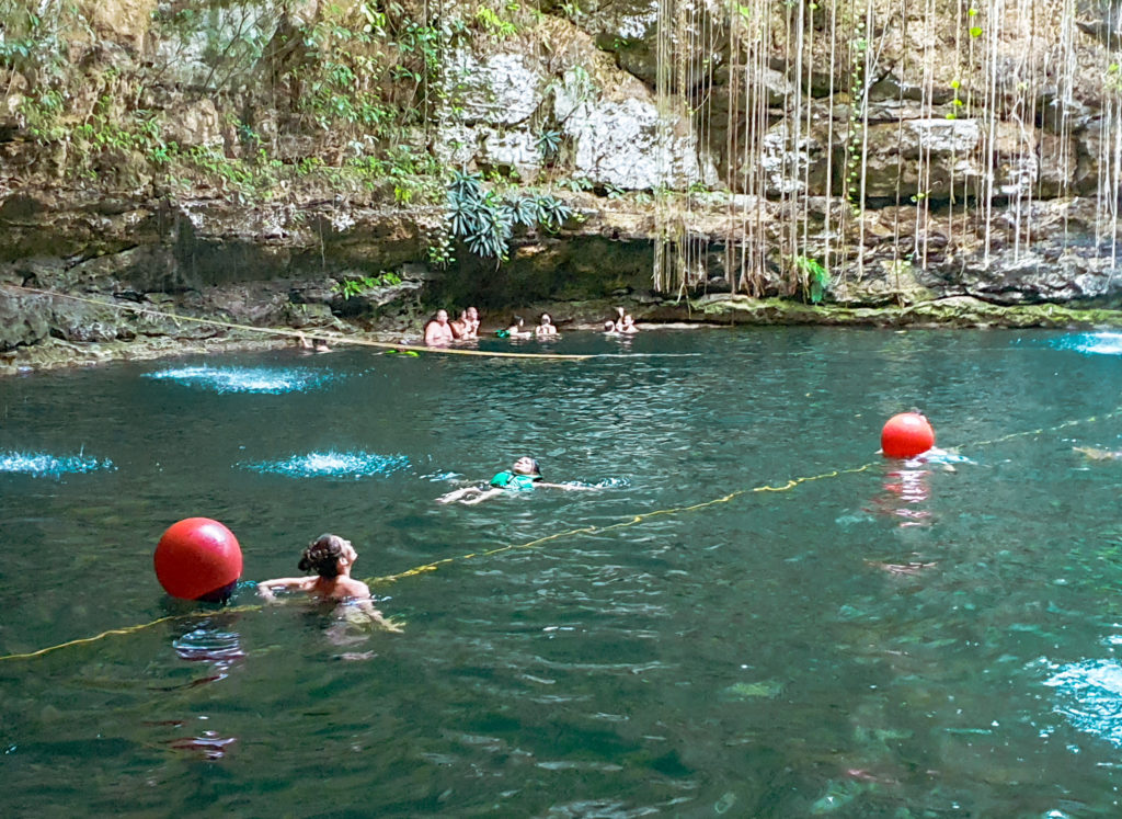 Swimming in Cenote Ik Kil