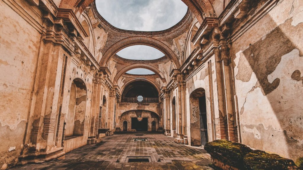 Ruins of the church of Santa Clara in Antigua Guatemala, with arches and open rooftops