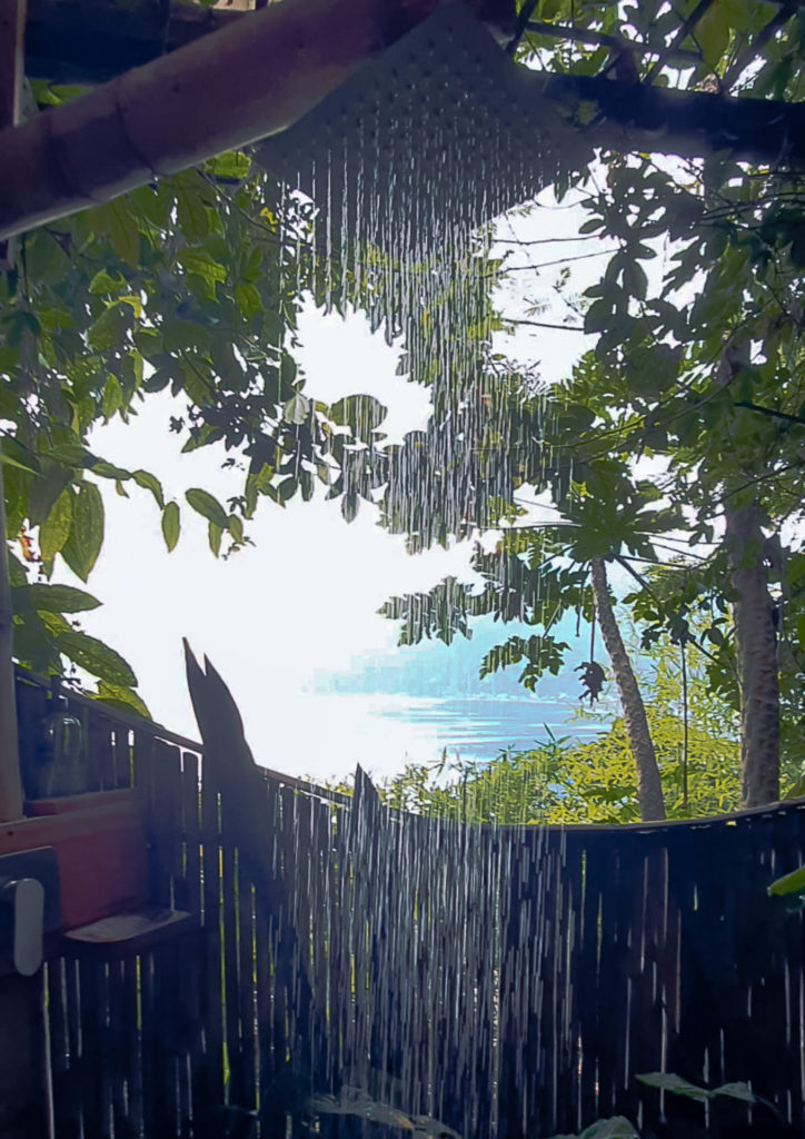 Shower surrounded by nature with a lake view at Eagle's Nest Atitlan