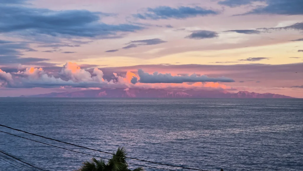 Boca Cangrejo sunset Sunset over the ocean and view of an island in the distance