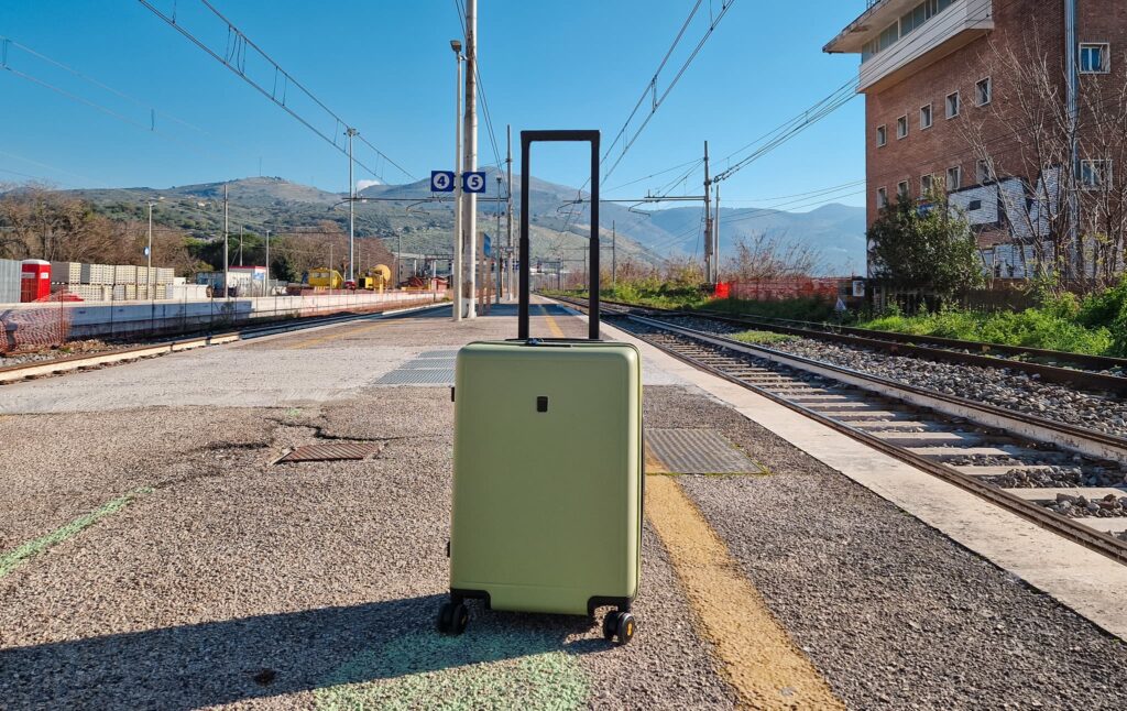 Level8 suitcase at the train station in Italy