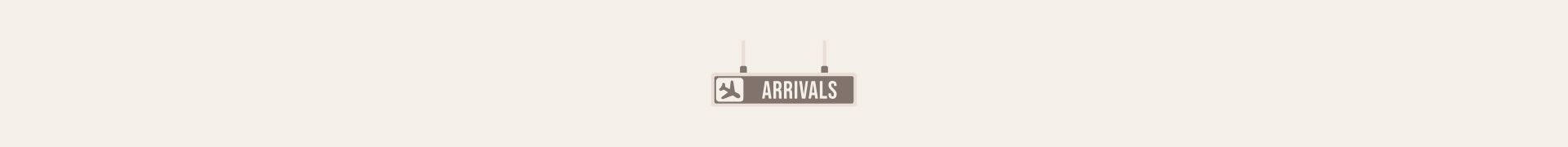 Arrivals Arrivals sign hanging from two cords with an airplane icon on the left and the word ARRIVALS on a beige background.