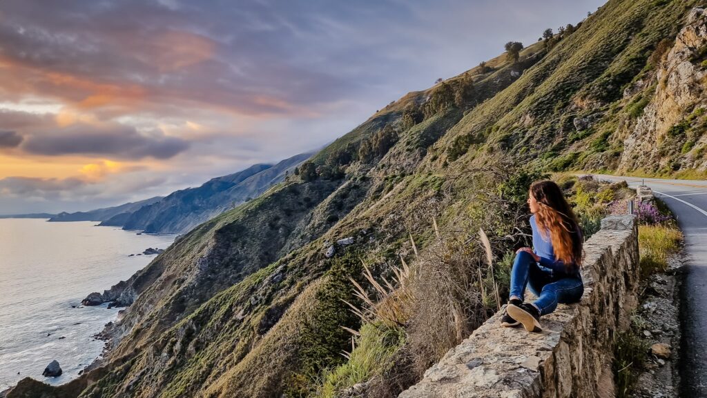 California Pacific Coast Highway Woman looking towards the sea on the California Pacific Coast Highway