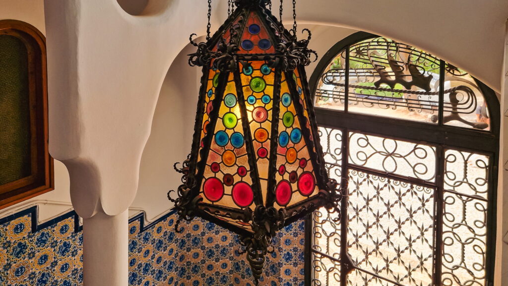 Chandelier at Torre Bellesguard Colorful chandelier inside Torre Bellesguard, how to visit every Gaudí building in Barcelona