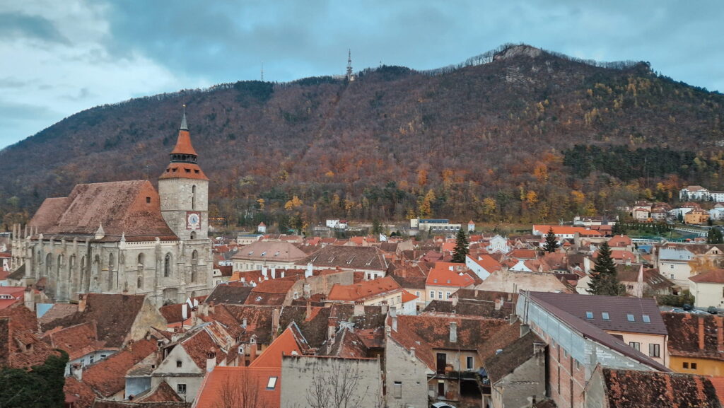 Brasov and Tampa Brasov view of the Old Town and Black Church with Tampa mountain in fall colors