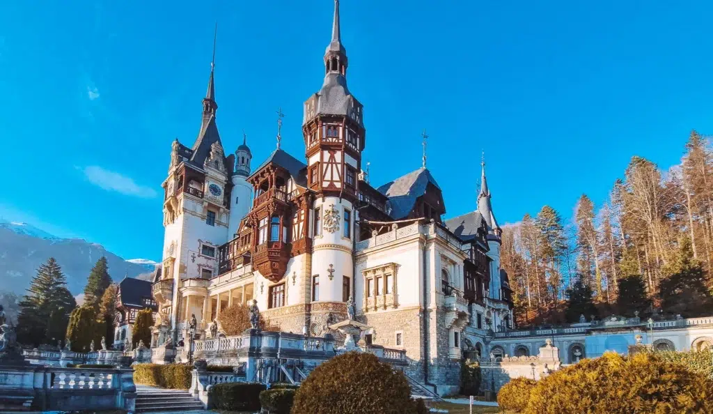 Peleș Castle in autumn Peleș Castle against a blue sky in autumn, Sinaia