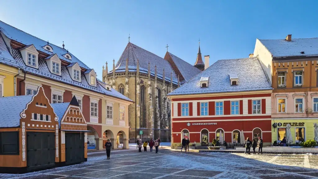 November in Brașov Brasov - Council Square and Black Church with a bit of snow