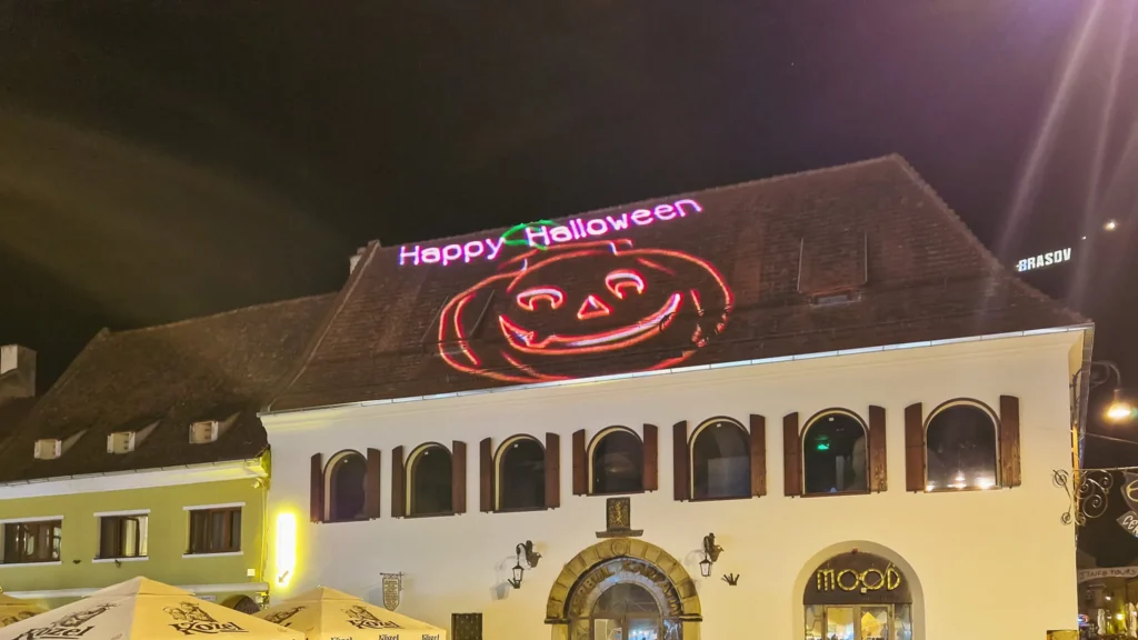 Brasov, Halloween Halloween light decoration on a house in the center of Brasov
